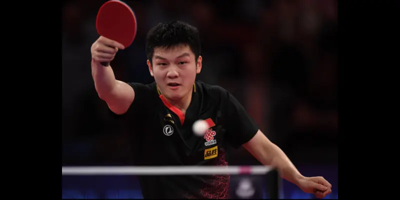 Fan Zhedong playing a backhand smash in Table tennis